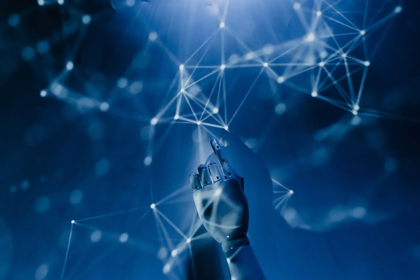 A hand connecting points in a digital network
